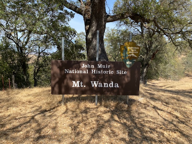 A sign depicting the John Muir Historical Site